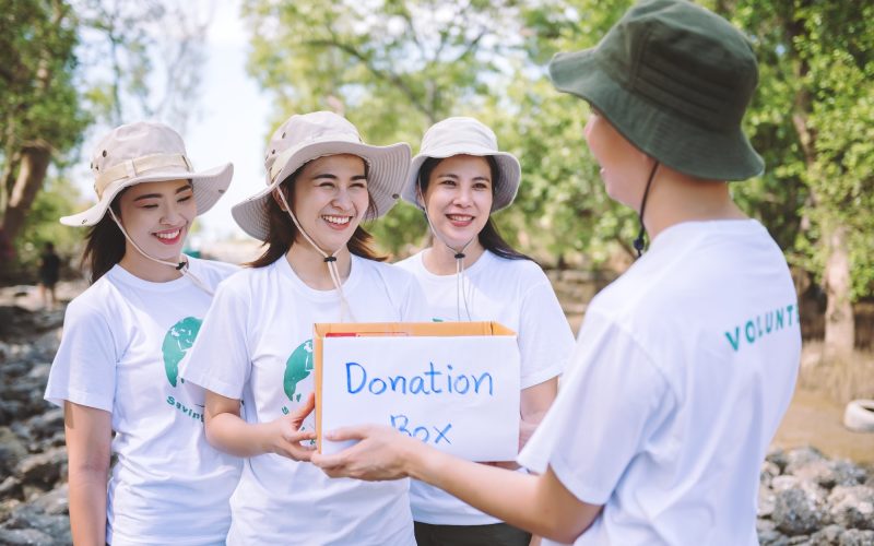 group-of-asian-diverse-people-volunteer-holding-a-donation-box-for-world-environment-day-campaign-.jpg